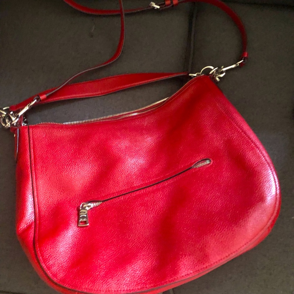 Yummy Coach Purse with two straps.